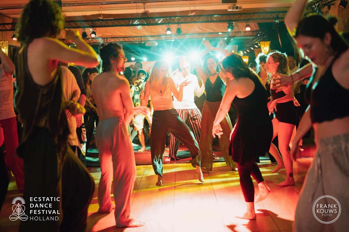 A full dance floor at night