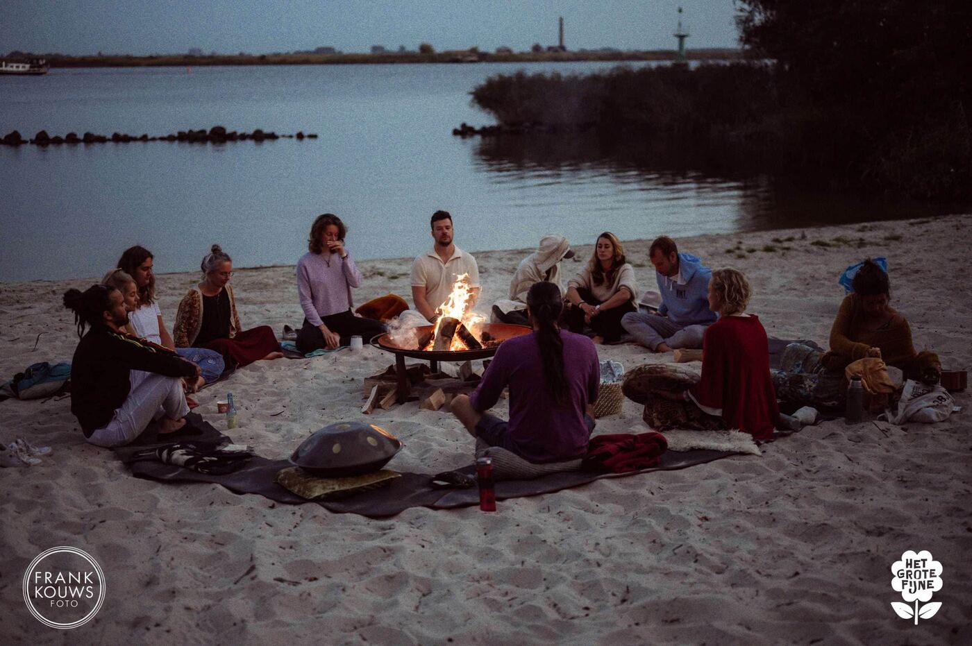 A fire circle with handpans at dusk