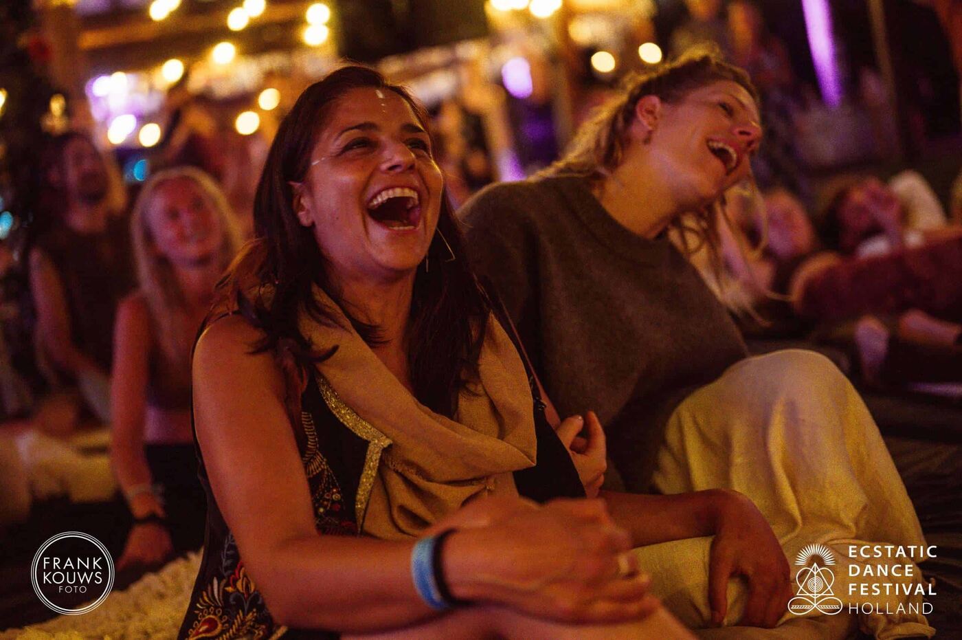 Two friends laughing until it hurts